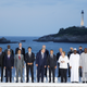 Group of Seven leaders and guests pose for the G7 family photo Sunday, Aug. 25, 2019 in Biarritz.